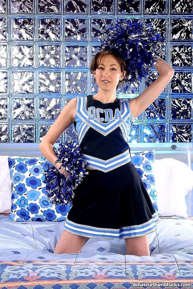 Sexy Lena Solis Sits on Her Asian Pussy Toy and Exposes Her Cheerleader Body - Lena Solis