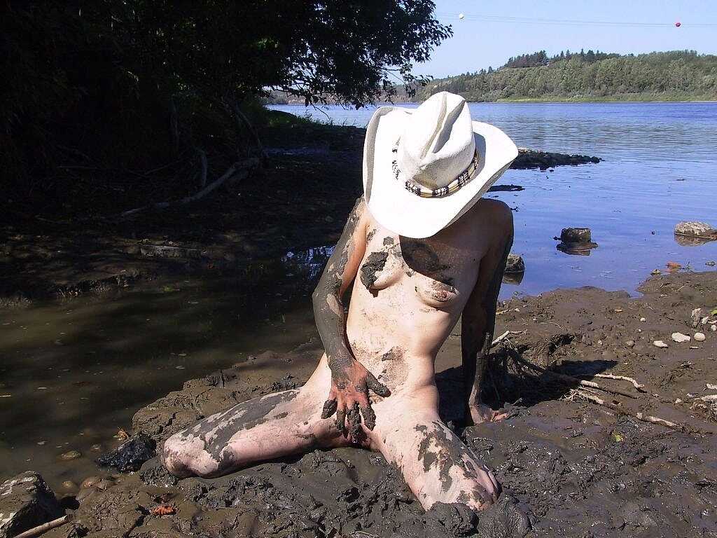 Muddy Nipples Erika's Cowgirl Adventure Or, if you prefer a more direct approach:- Erika Shelley: Skinny Babe in a Cowboy Hat Flaunts Her Tiny Tits and Spreads Naked in the Mud