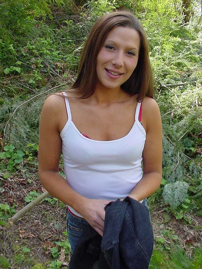 Skinny teen Alexis Suarez strips in the forest & poses in her panties & jeans.