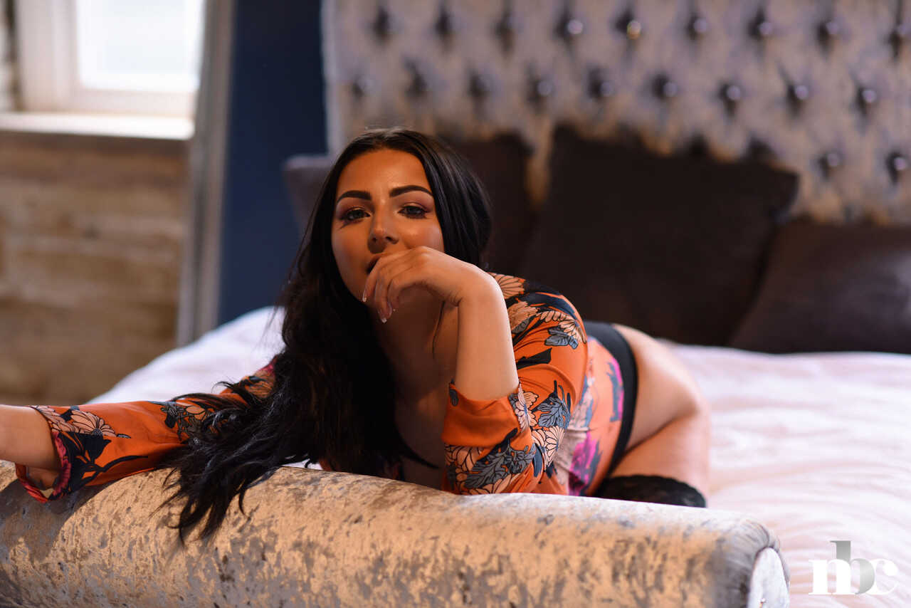 Chubby brunette Foxy Lucina strips her blouse off and shows her huge tits, thick thighs, and sexy curves. - Foxy Lucina