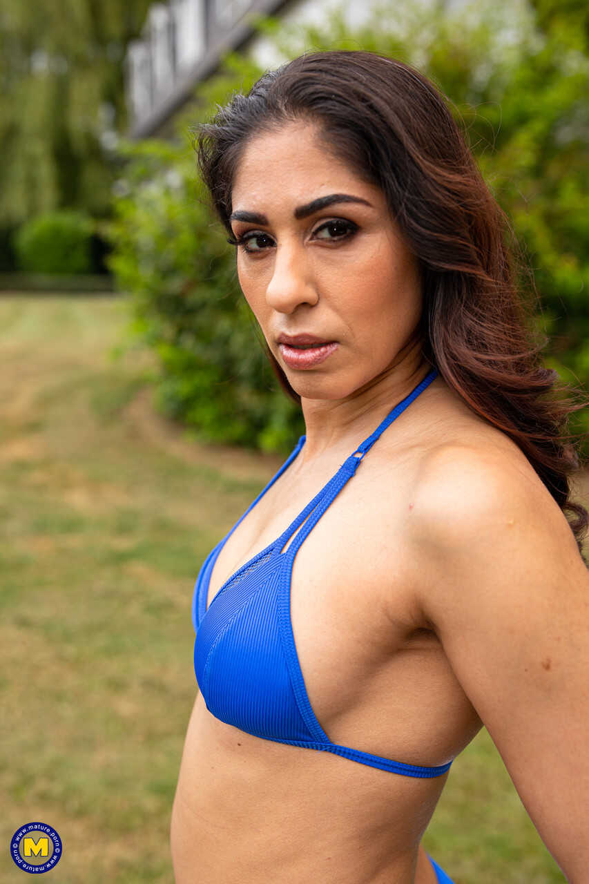 Brunette wife Sahara Knite strips her blue bikini & spreads her extremely hairy pussy outside for the camera - Sahara ...
