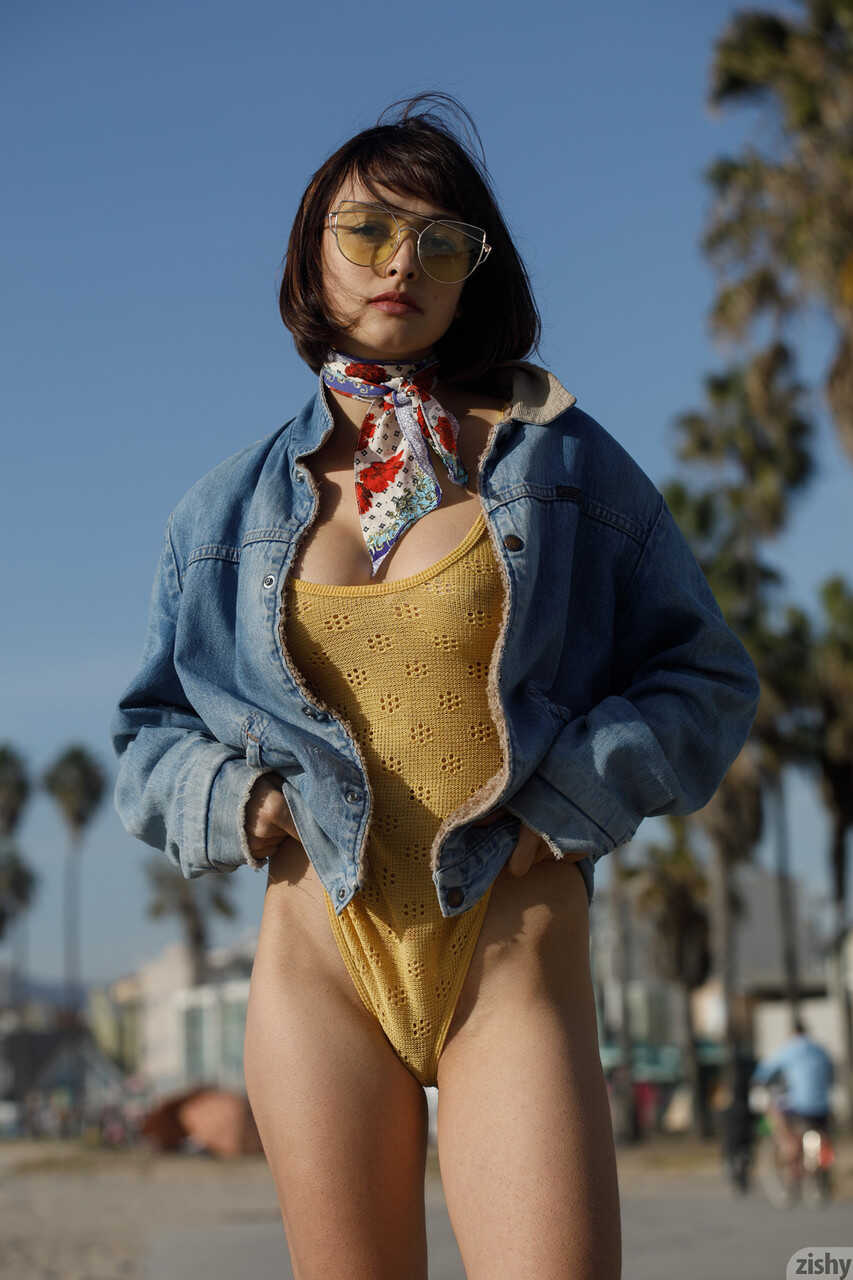 Adorable teen Basil Navas poses on the beach in yellow see-through bodysuit gets nerdy with glasses and a swimsuit!