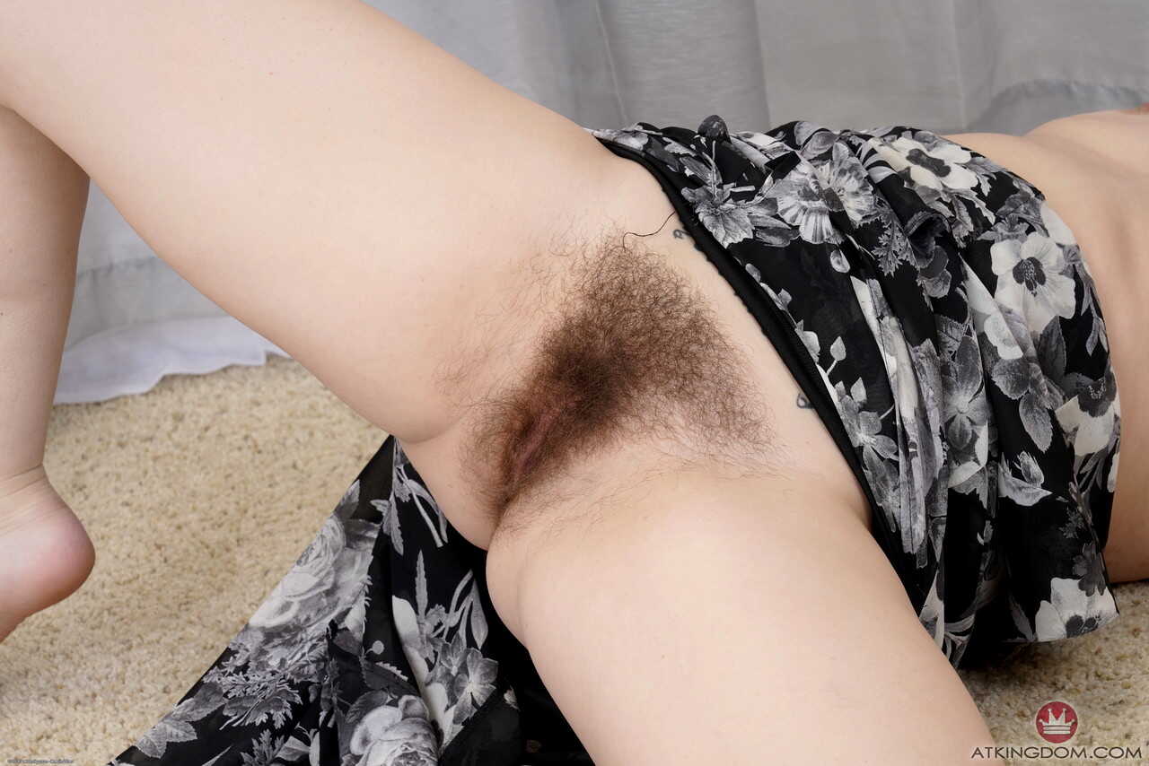 Kinky wifey Edyn Blair unveils her bushy beaver and big tits on the floor while spreading her hairy pussy for an upskirt s...