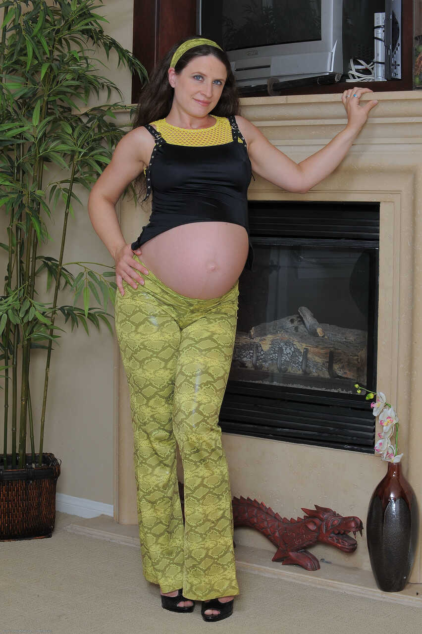 Pregnant Mommy Lena Loves Fingering Her Hairy Pussy and Ass by the Fireplace - Lena Ramon