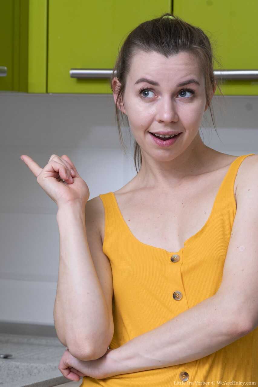Hairy Little Ira Verber spreads her wet twat in the kitchen while masturbating with her toes pointed out - Little Ira Verber