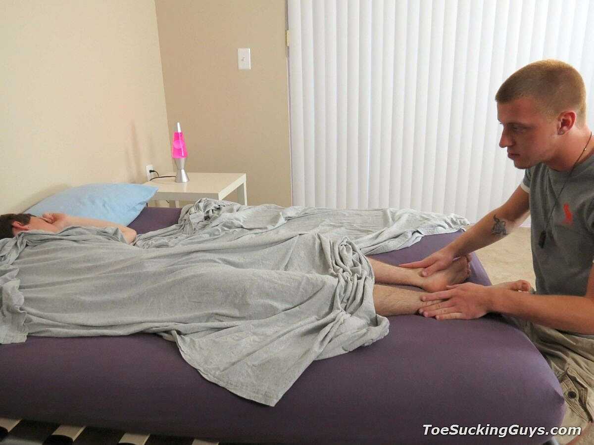 Two hot studs, Justin Cross and Travis Cooper, give each other's hard dicks a passionate blowjob! - 