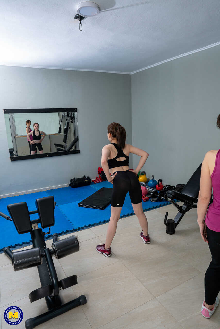 Young Roxane's first time with mature Maya leads to hot lesbian action at the gym - Kira Stone, Roxane