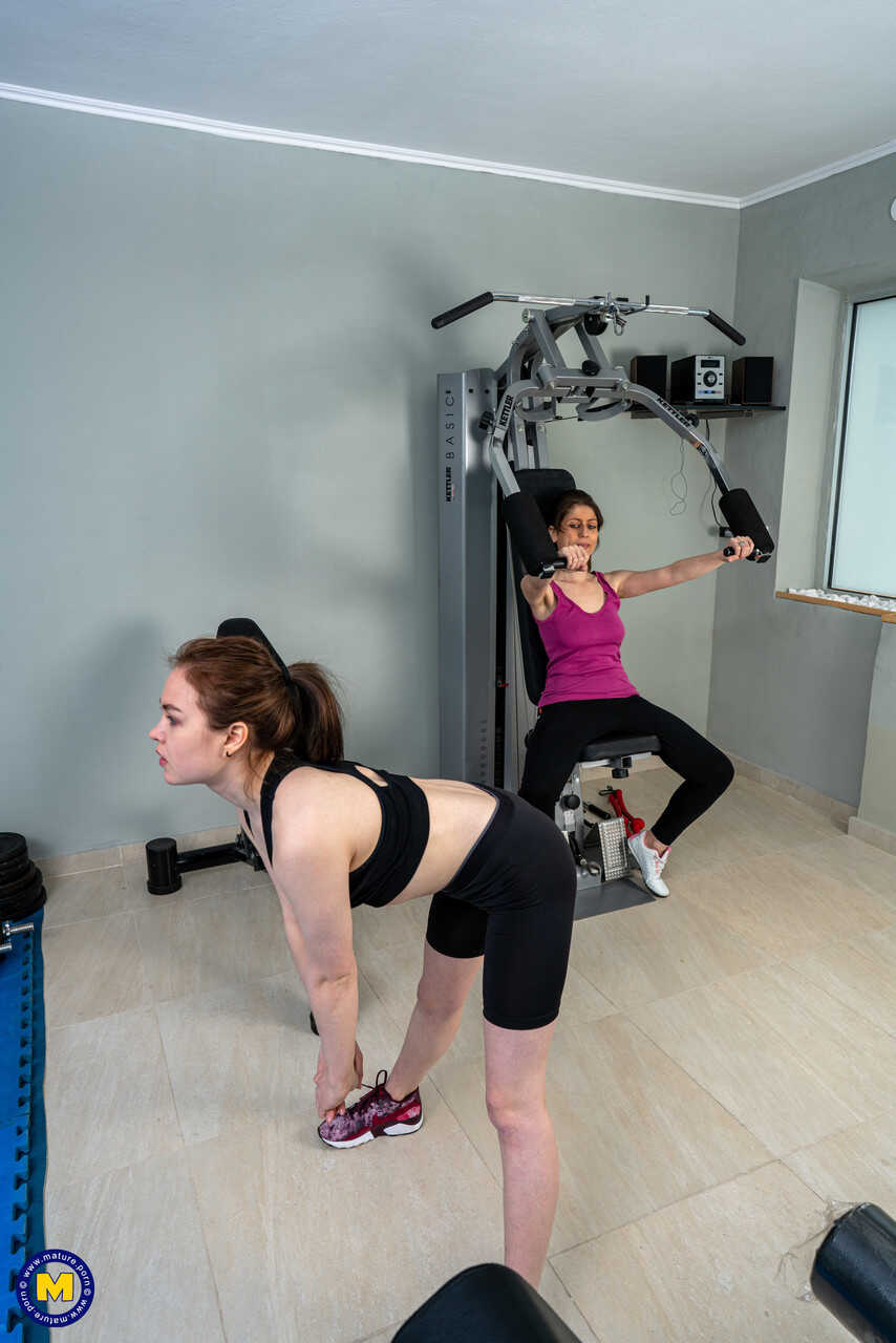 Young Roxane's first time with mature Maya leads to hot lesbian action at the gym - Kira Stone, Roxane