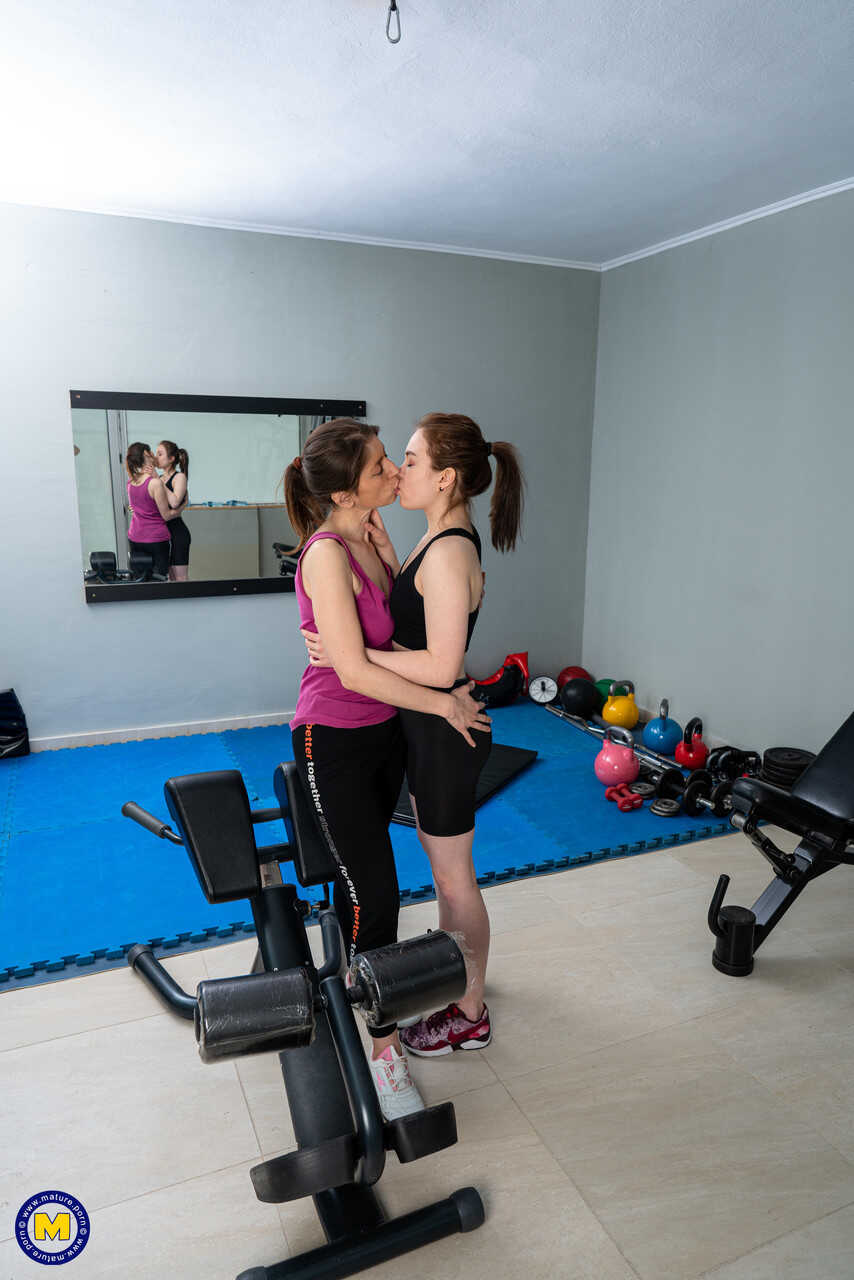 Young Roxane's first time with mature Maya leads to hot lesbian action at the gym - Kira Stone, Roxane