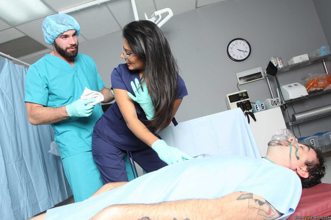 Black haired nurse Shazia Sahari gets her mouth and pussy banged by a doctor while wearing sexy lingerie gloves A dark-nip...