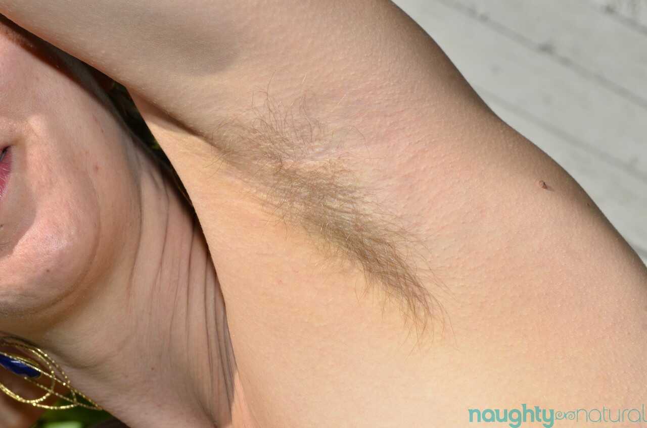 Amateur female Azaela exposes her hairy armpits and fingers her bushy clam while going MILF outdoors in natural lighting -...