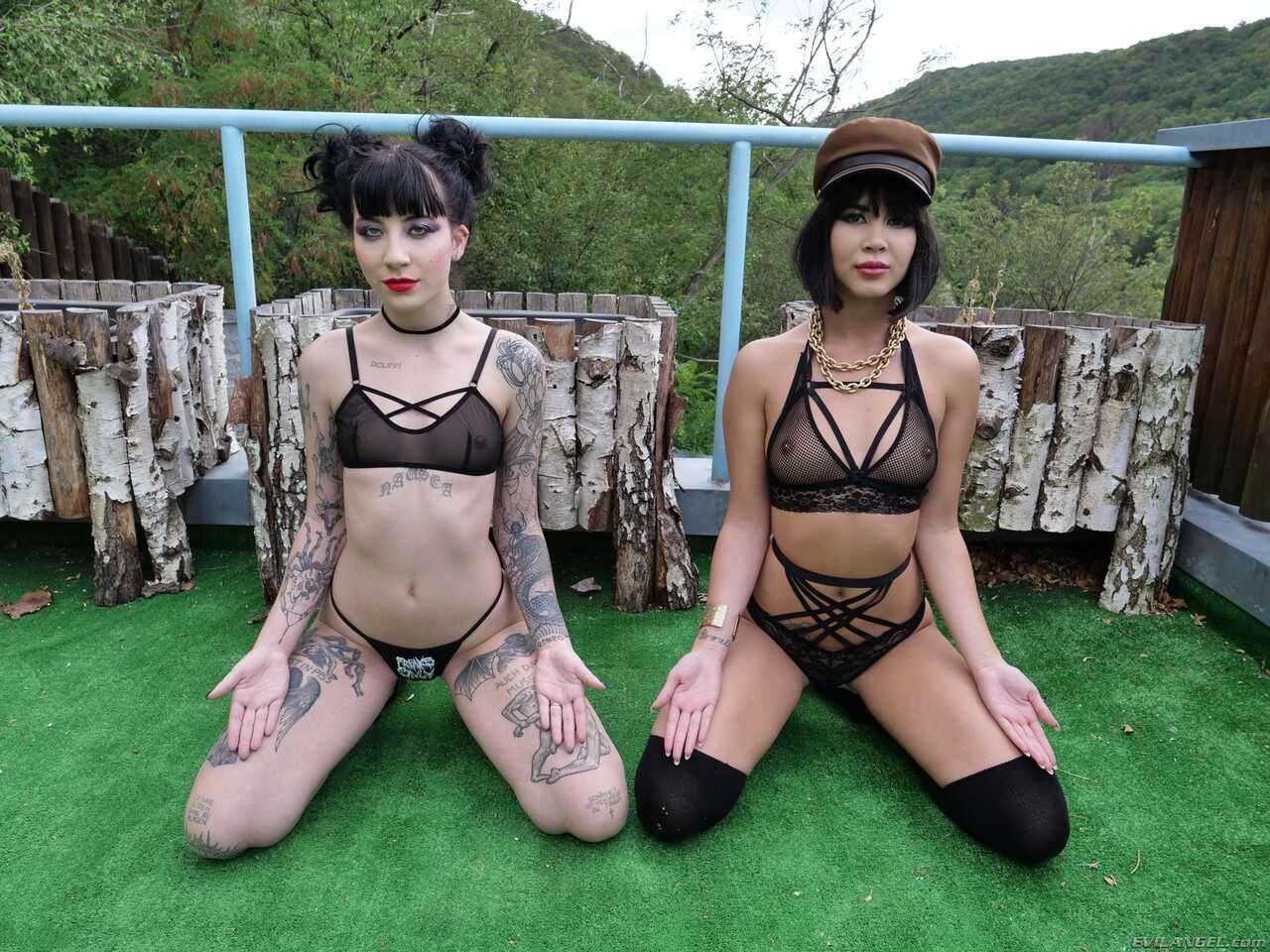 Lady Dee and Charlotte Sartre, Lesbian Babes Show Off Their Bums in Sexy Lingerie while Teasing on the Beach