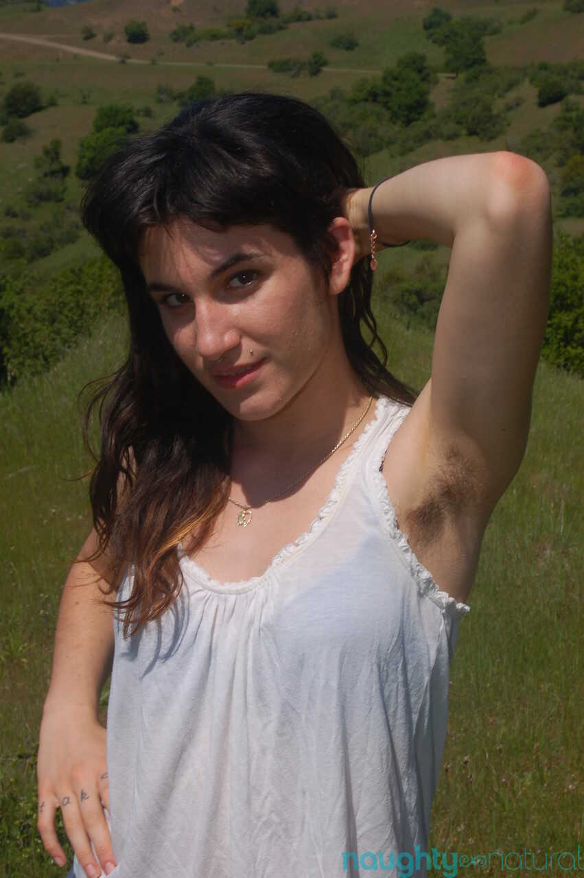 Horny amateur Joey Minx reveals her naturals and hairy vagina outdoors a naughty adventure with puffy nipples and skinny b...