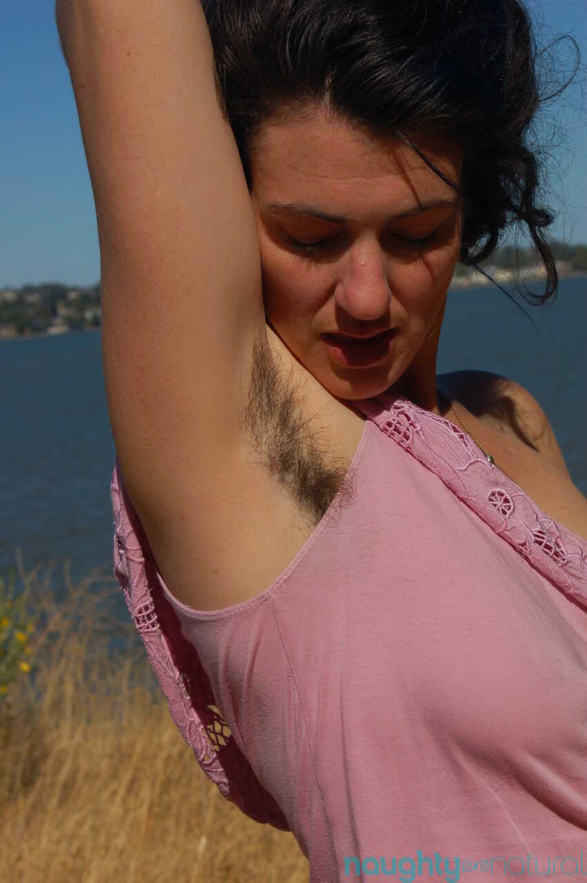 Hairy armpit diva Sadie Lune strips naked outdoors to show off her furry bush and petite tits