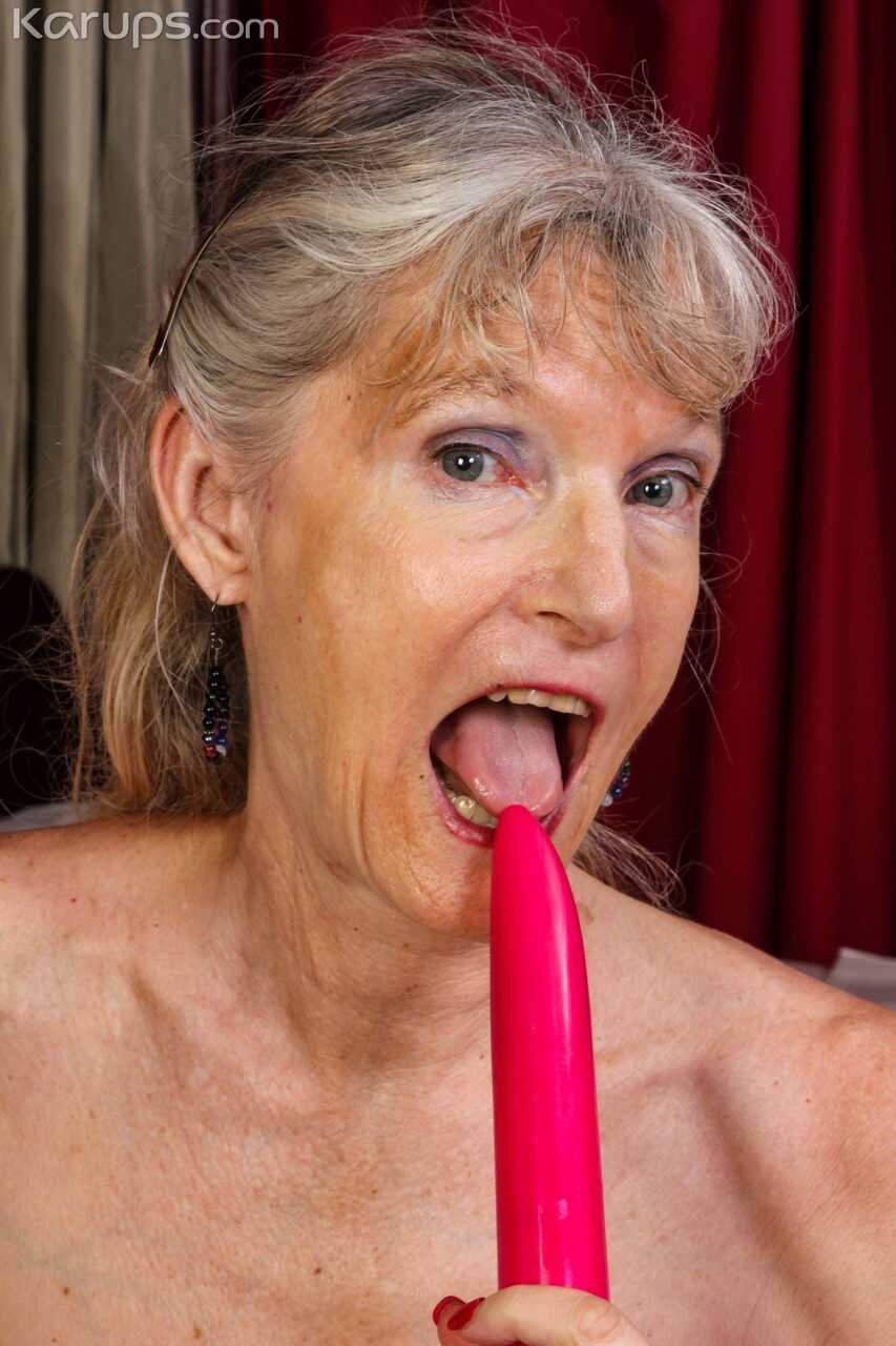 Skinny granny Lisa Cognee exposes her natural tits and masturbates on her bed  Hairy Granny's Hot Honey Pot   Very Ol...