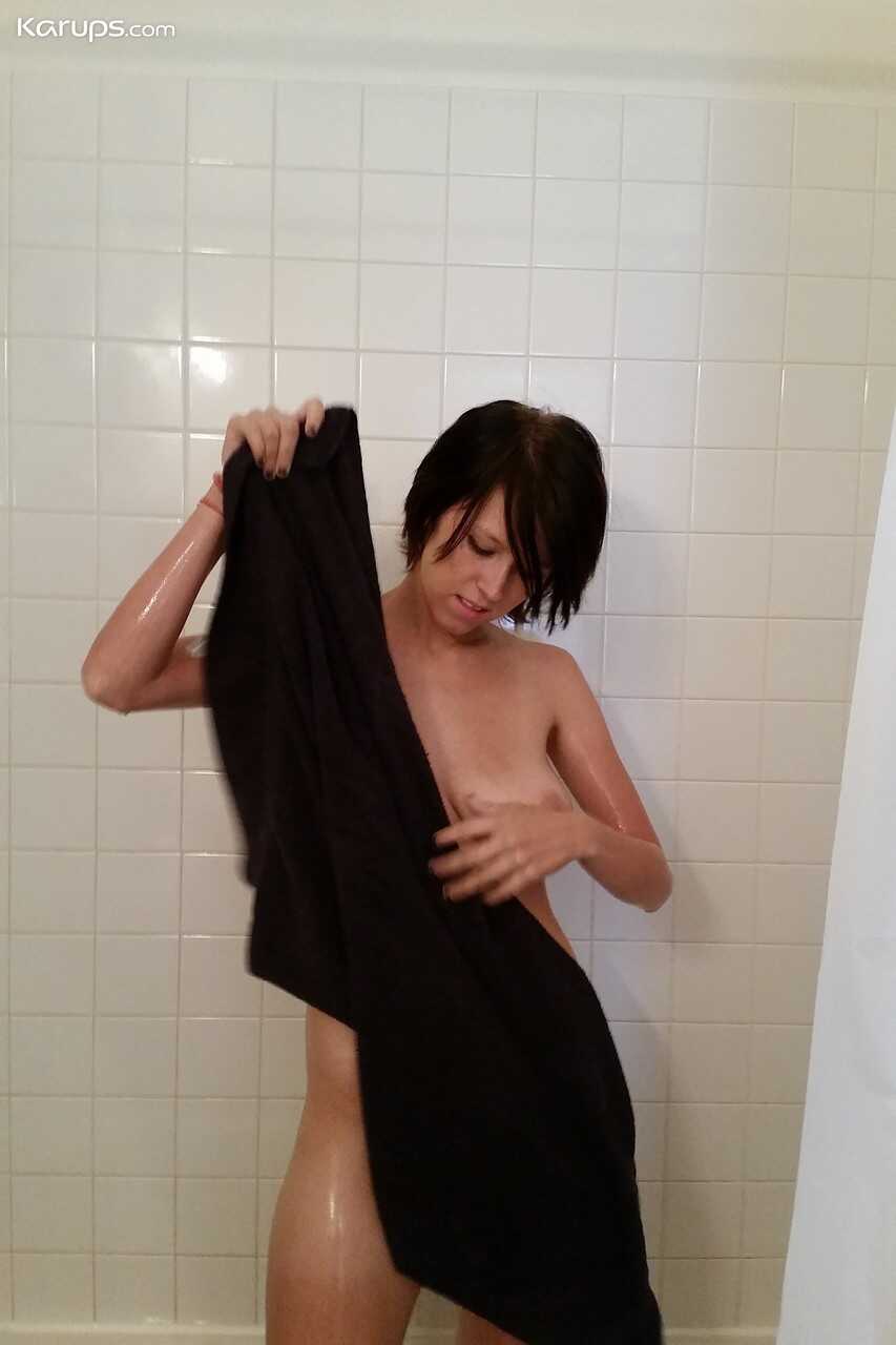 Brunette teen Velvetine gets soaked in the shower as she shows off her big tits & shaved pussy - Velvetine