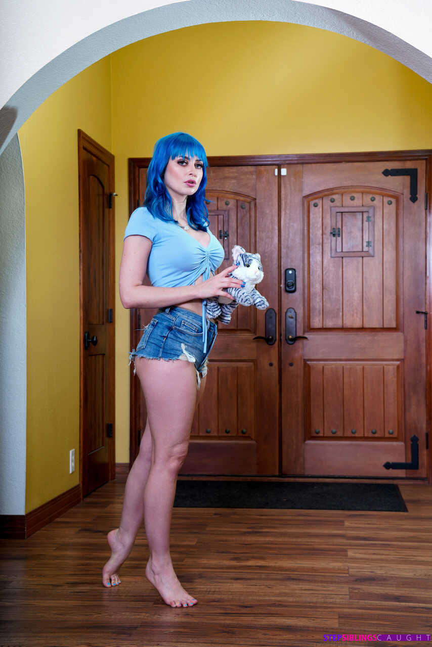 Blue-haired Jewelz Blu seduces her stepbrother and humps his rod while he cosplays as a tight pussy MILF with perfect puss...