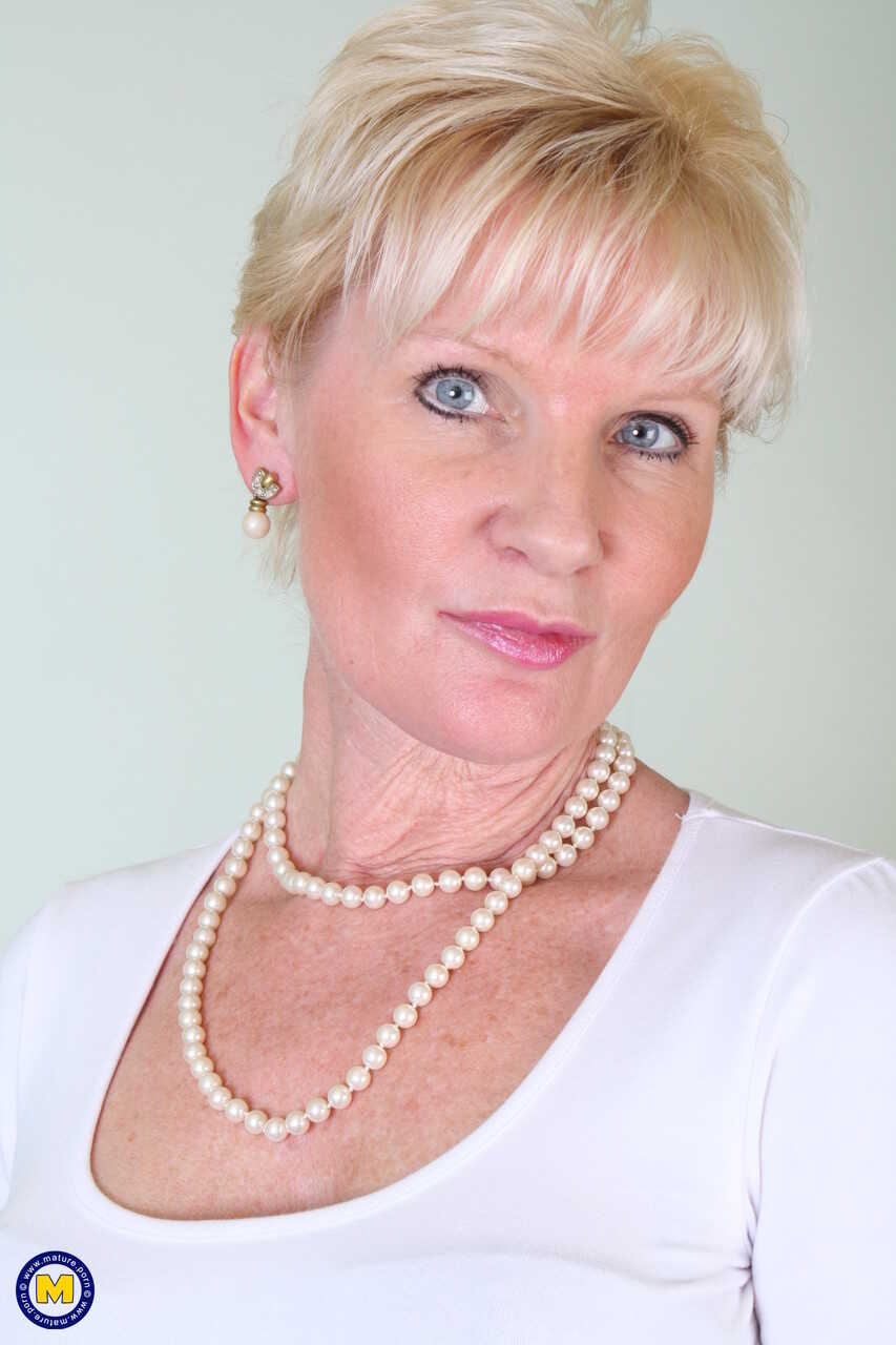 Danni's Black Desire: A Short-haired Lady in Exotic Lingerie Teases Her Pink Muff - Danni