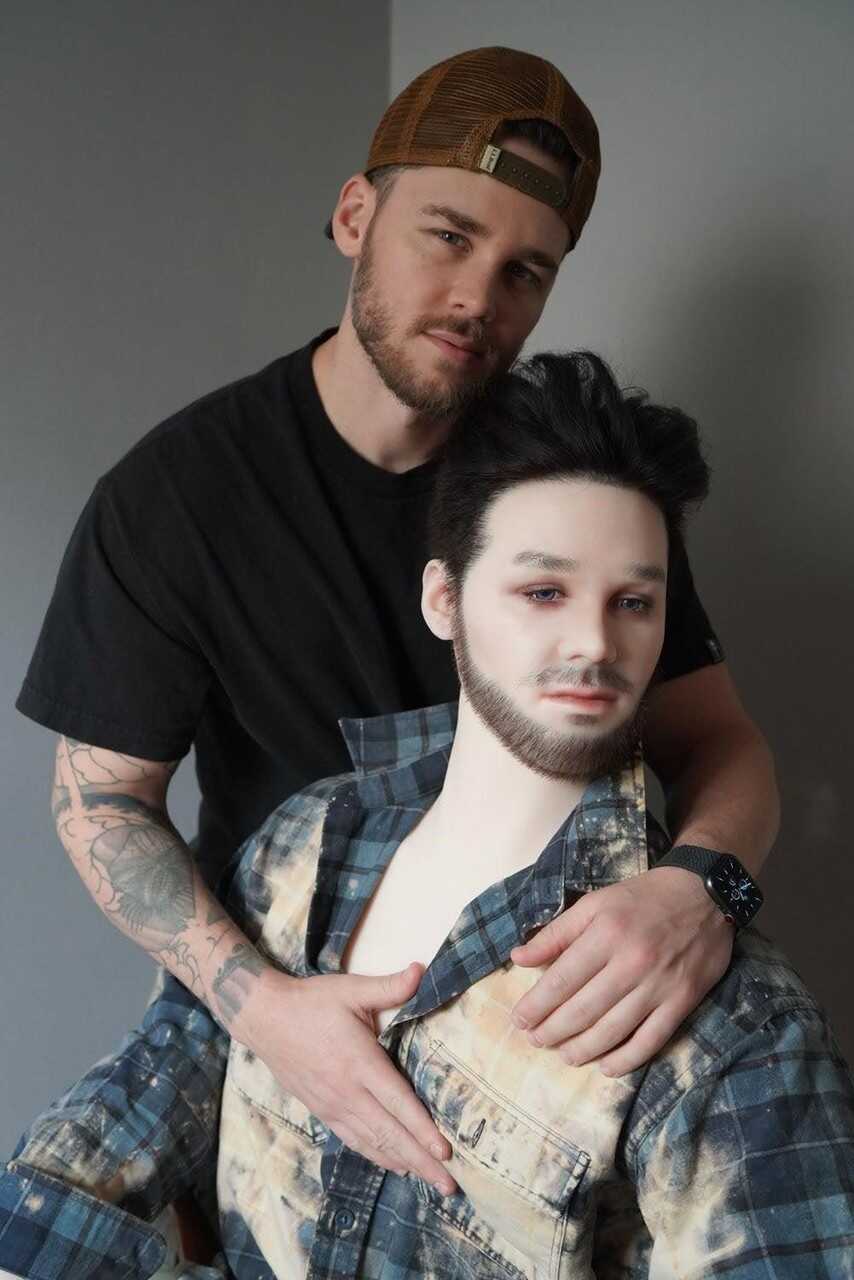 Gay pornstar Matthew Camp riding a stiff, lifelike sex doll in hardcore action