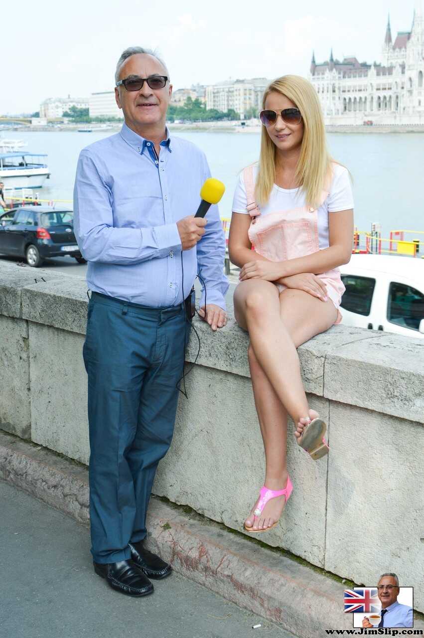 All-natural blonde Christine C gets seduced and fucked by an old reporter while wearing sexy sandals, stockings and no pan...