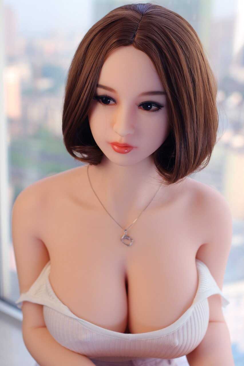 Gizelle's Incredible Cleavage Puts Her Japanese Sex Doll to the Test!