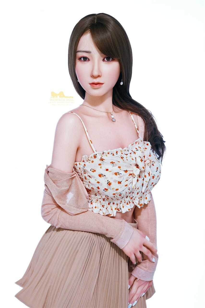Busty Brunette Sex Doll Shows Off Her Pink Pussy in a Flawless Photoshoot - 