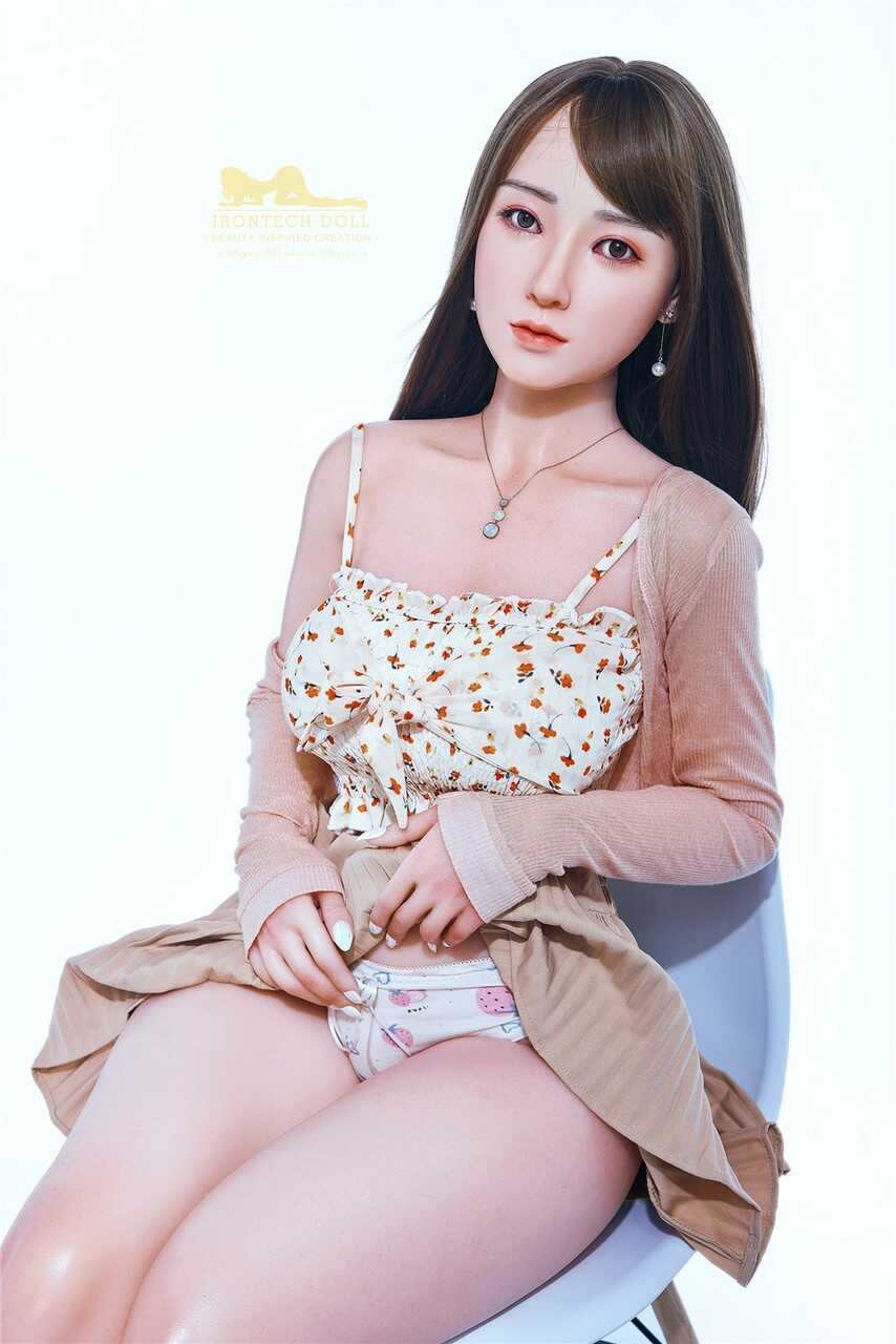 Busty Brunette Sex Doll Shows Off Her Pink Pussy in a Flawless Photoshoot - 