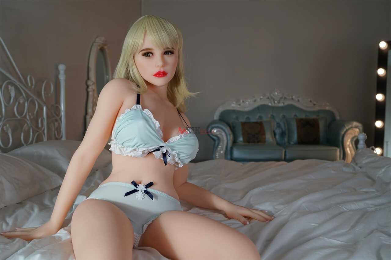 Pretty blonde sex doll with perfect breasts and round butt spreads her legs for you. - 