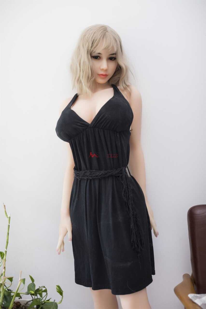 Amie's Huge Boobs Exposed: Blonde Sex Doll Flaunts Her Assets in Black Lingerie - 