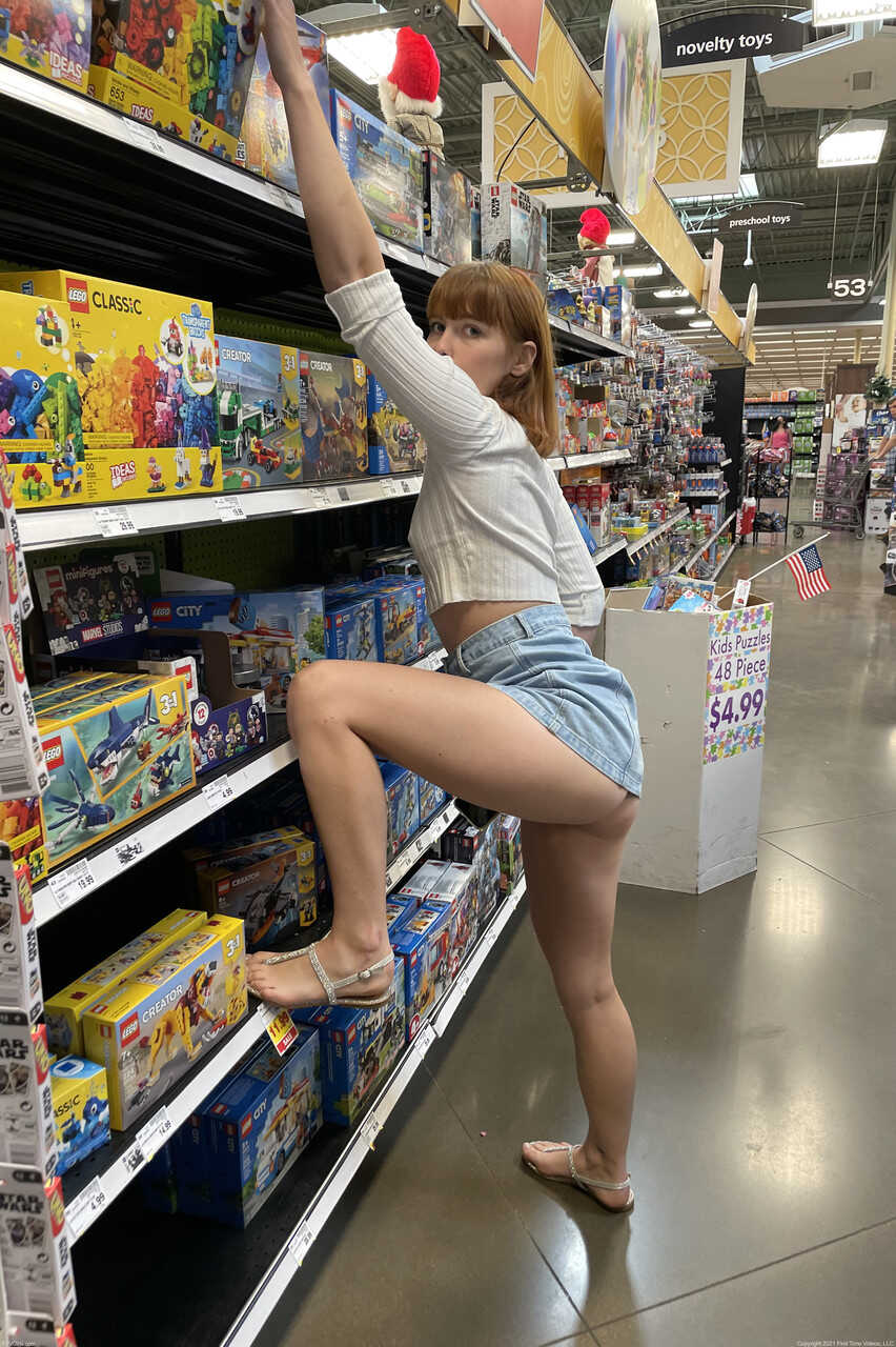 Glamour babe Ginger toys her shaved pussy with a veggie and with her dildos - Ginger Grey