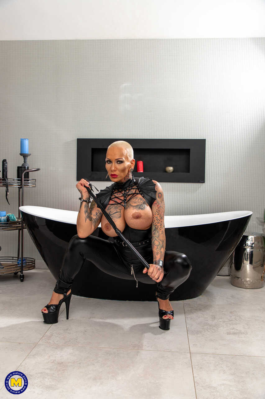 German MILF Kitty Core's Leather BondageFeaturing Faith Core with her Big TitsIn which the German Amateur Mature Woma...