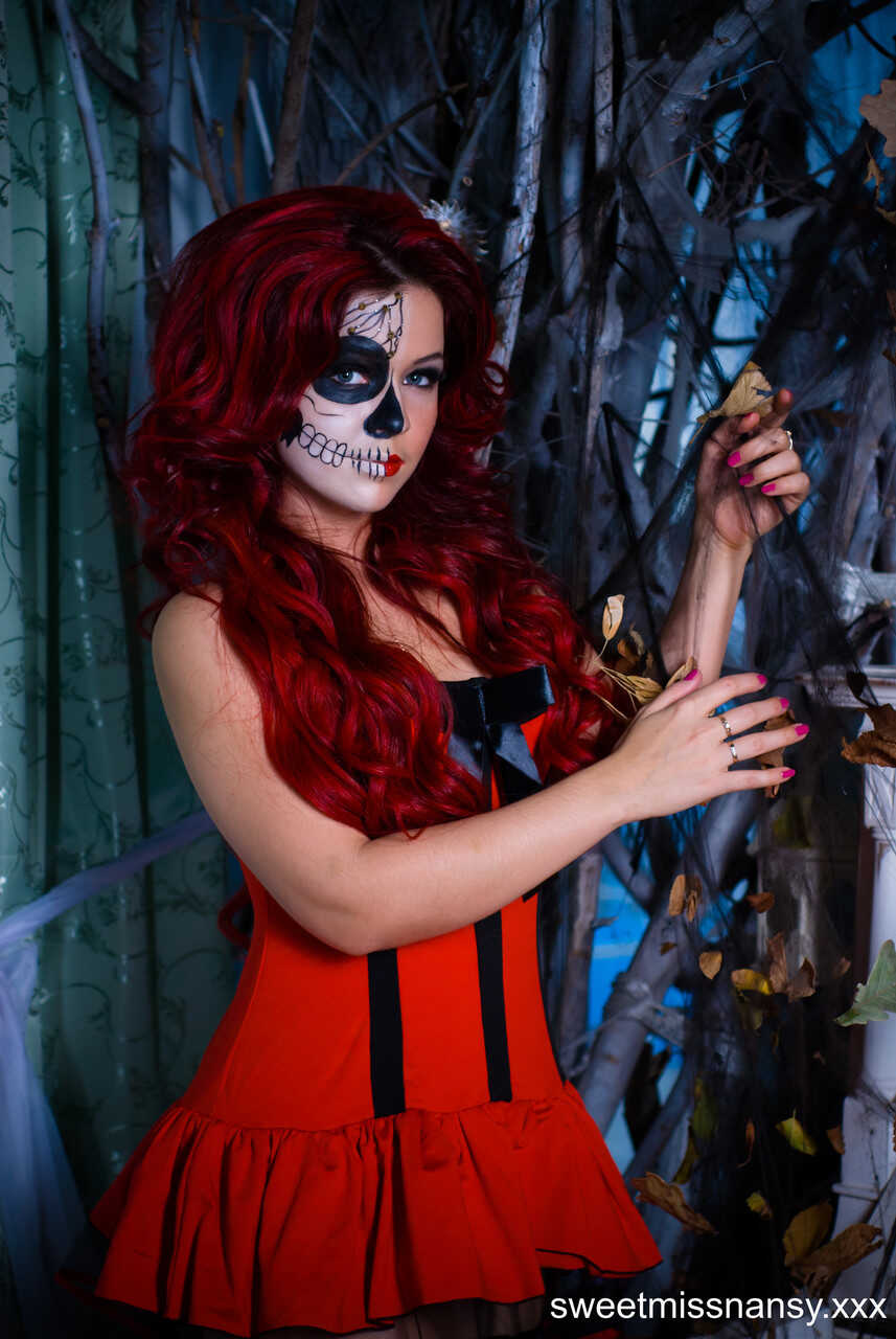 Busty Redhead Yummy Alice Shows Off Her Curves in a Sexy Costume on Halloween Night - Yummy Alice