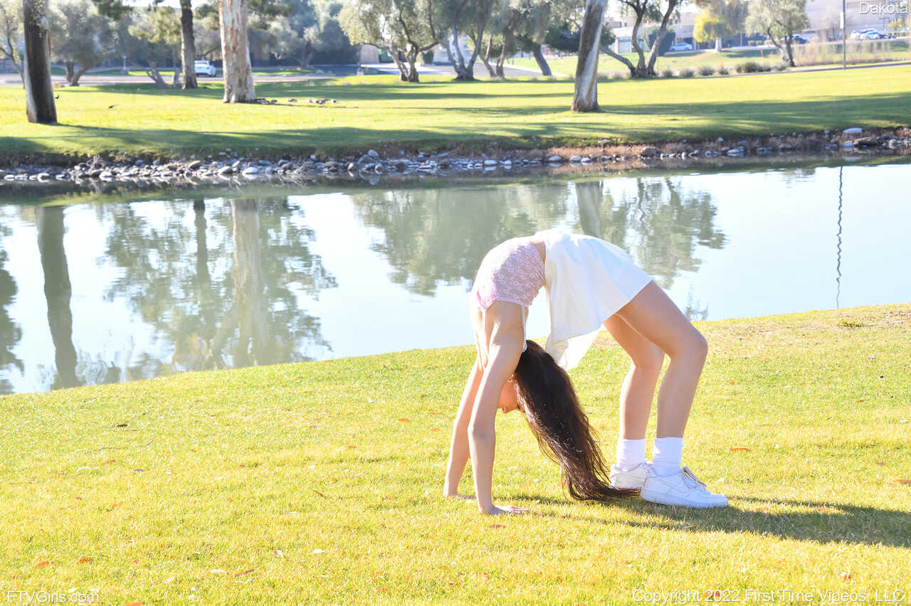 Sneaker-Wearing Amateur Babe Dakota Tyler Unveils Her Tiny Tits and Does a Handstand by the River in 'Hot Naked Women...