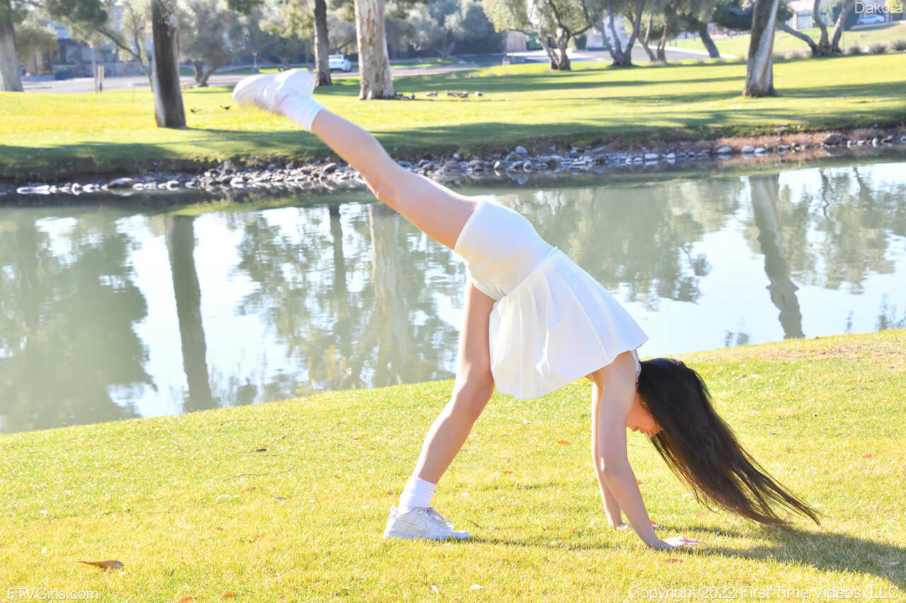 Sneaker-Wearing Amateur Babe Dakota Tyler Unveils Her Tiny Tits and Does a Handstand by the River in 'Hot Naked Women...