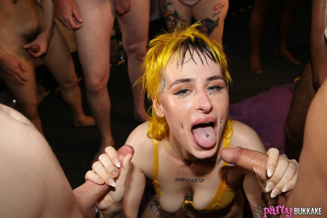 Ink-stained slut takes a load in her mouth and sprays cum all over her tatted up face at the Lana Banana Bukkake Bash! - L...