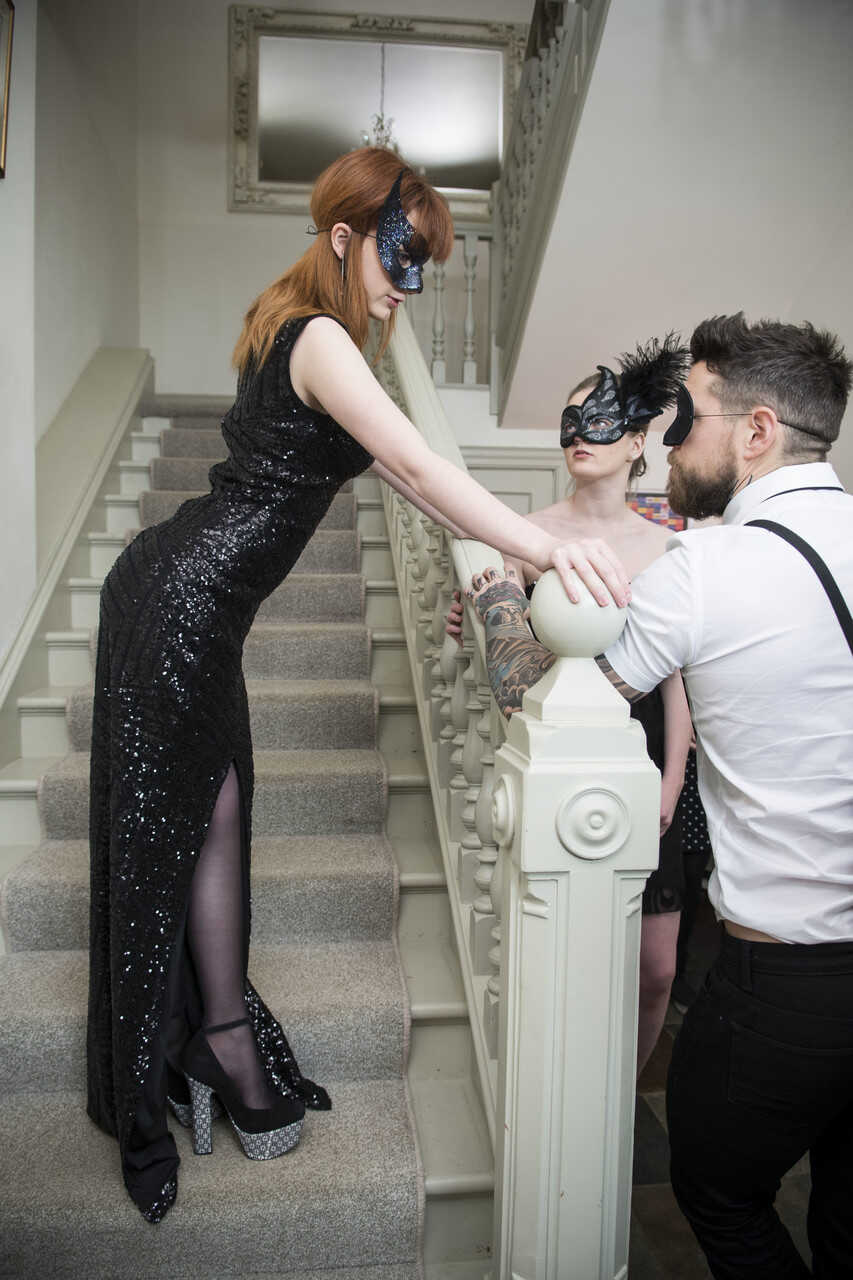 Lustful Masked Redhead with Big Tits, Carly Rae, Gets Rammed on the Stairs by Lustful Dean Van Damme while Skinny Lola Gat...