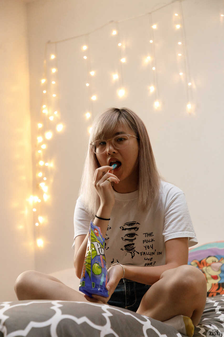 Asian babe Barbie Qu strips in the bedroom and shows her lovely hairy body - Barbie Qu