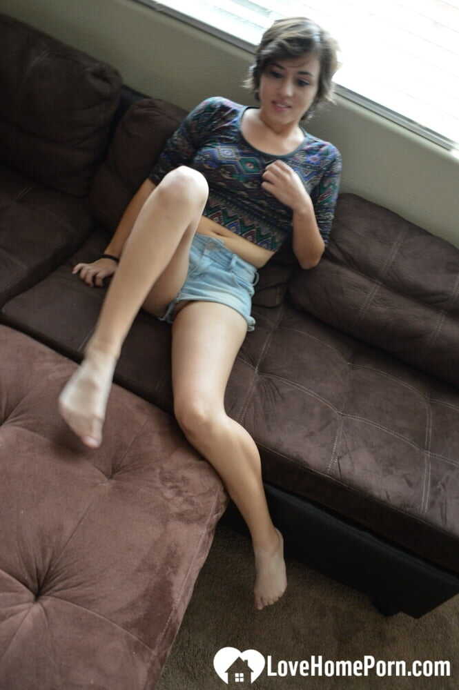Brunette Nymphomaniac Strips Fully Naked and Masturbates with a Dildo on the Couch while Watching 'The Notebook'...