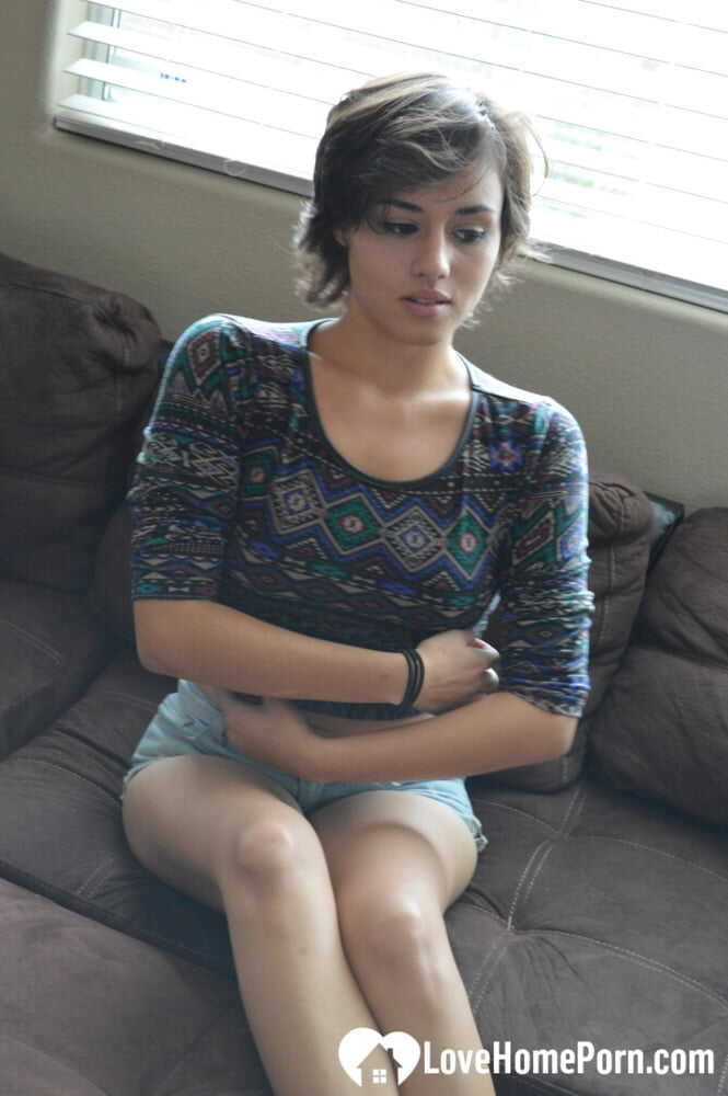 Brunette Nymphomaniac Strips Fully Naked and Masturbates with a Dildo on the Couch while Watching 'The Notebook'...