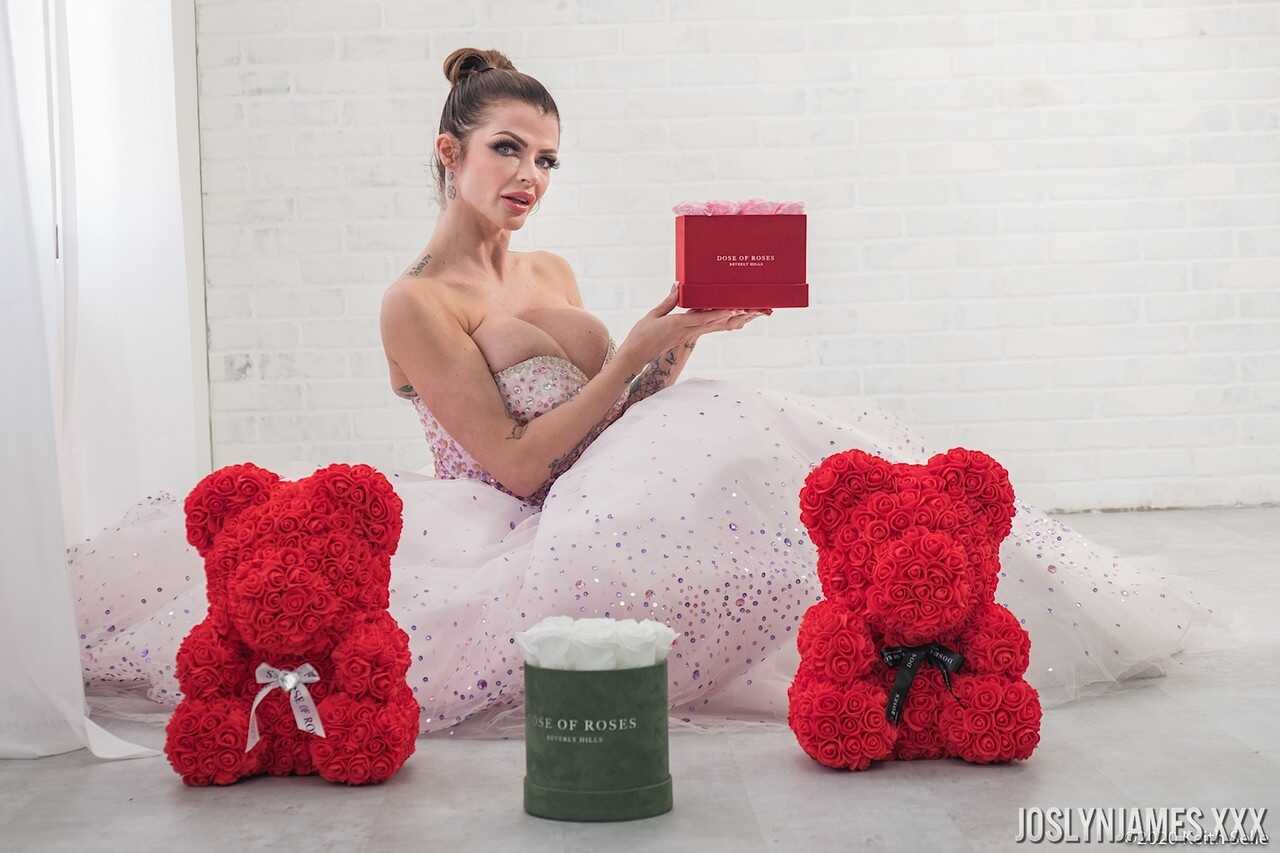 Busty MILF Joslyn James unties her wedding dress to reveal her massive cleavage - Joslyn James
