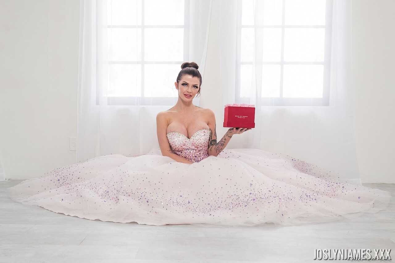 Busty MILF Joslyn James unties her wedding dress to reveal her massive cleavage - Joslyn James