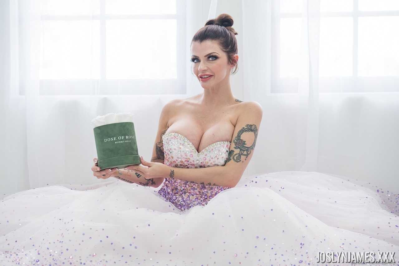 Busty MILF Joslyn James unties her wedding dress to reveal her massive cleavage - Joslyn James