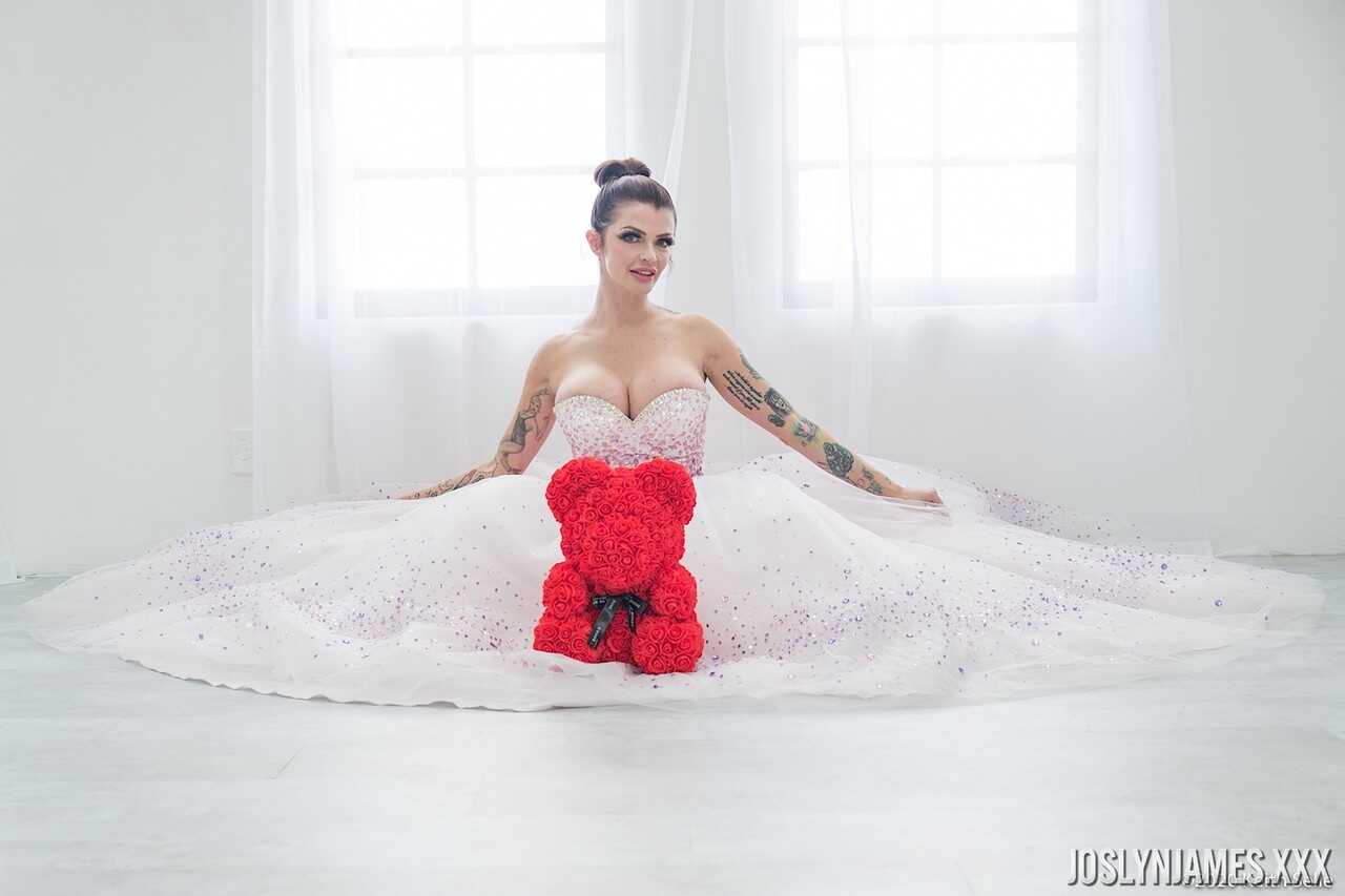 Busty MILF Joslyn James unties her wedding dress to reveal her massive cleavage - Joslyn James