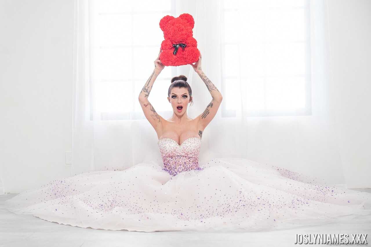 Busty MILF Joslyn James unties her wedding dress to reveal her massive cleavage - Joslyn James