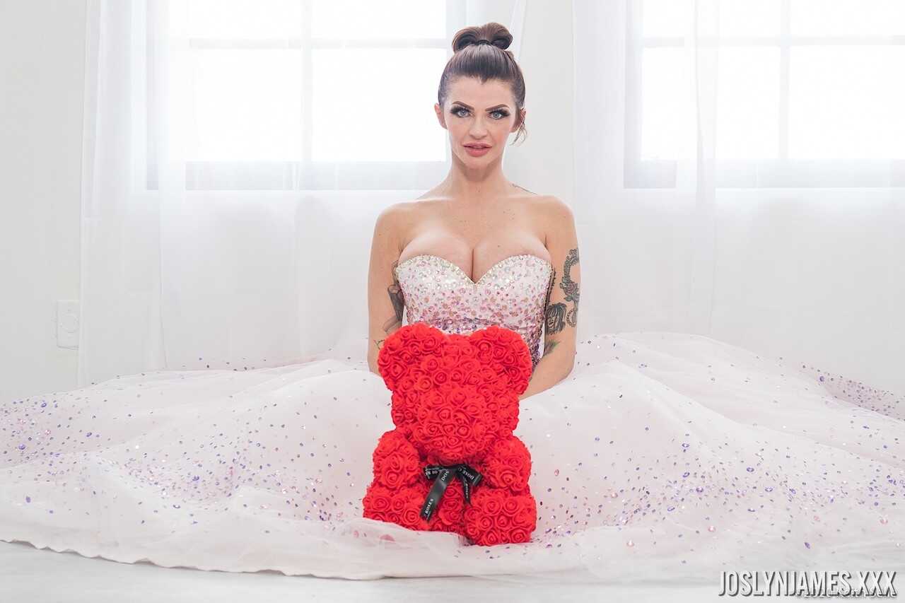 Busty MILF Joslyn James unties her wedding dress to reveal her massive cleavage - Joslyn James
