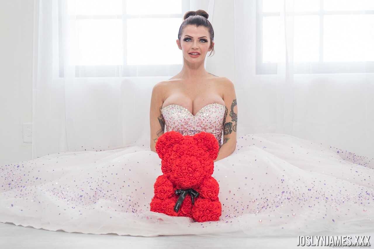 Busty MILF Joslyn James unties her wedding dress to reveal her massive cleavage - Joslyn James
