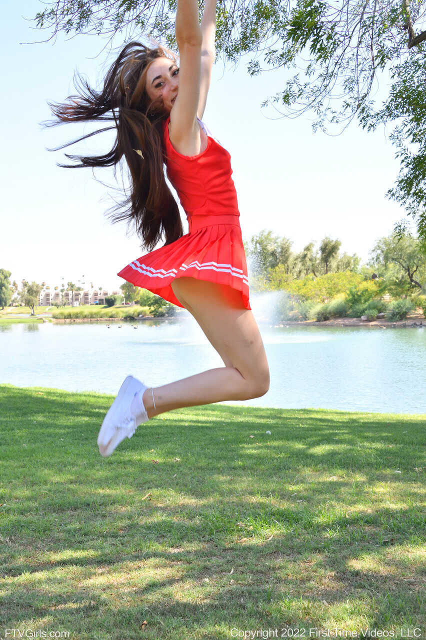 Pretty cheerleader Tori flashes her tit & masturbates with a vibrator outdoors while wearing a short skirt and no pant...