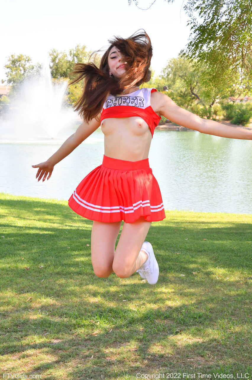 Pretty cheerleader Tori flashes her tit & masturbates with a vibrator outdoors while wearing a short skirt and no pant...