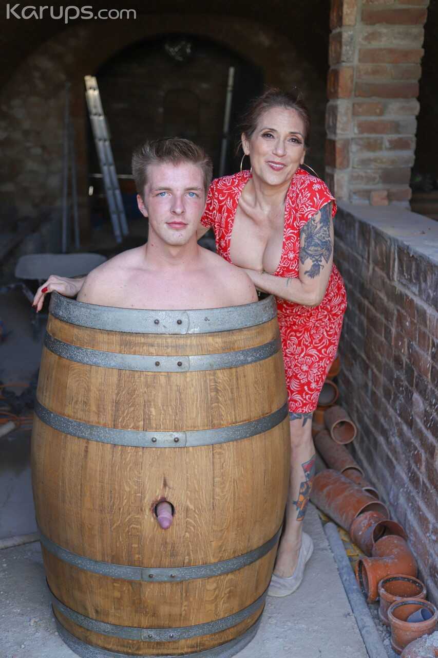 Brunette granny Melissa Johnson blows and humps a teen dick outdoors, while amateur pornstar Tony Milak creams her with hi...