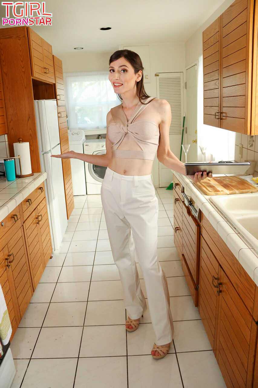 Skinny Brunette Shemale Korra Del Rio Strips and Blows a Dick in the Kitchen - Korra Del Rio